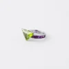 Anillo solitario Couleur Vivante – Oro blanco con peridoto y amatista Anillo solitario Couleur Vivante – Oro blanco con peridoto y amatista