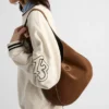 Bolso de hombro mediano de gamuza Bolso de hombro mediano de gamuza