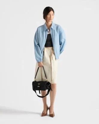 Bolso de hombro mediano «Explore» de Prada en piel napa con solapa