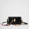 Bolso de hombro pequeño de cuero Prada Soft con dijes