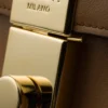 Bolso de hombro pequeño de cuero Prada Soft con dijes
