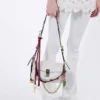 Bolso de hombro pequeño de cuero Prada Soft con dijes Bolso de hombro pequeño de cuero Prada Soft con dijes