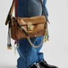 Bolso de hombro pequeño de cuero Prada Soft con dijes