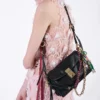 Bolso de hombro pequeño de cuero Prada Soft con dijes