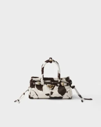 Bolso de mano Prada Bonnie Mini de piel estampada