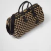 Bolso de viaje mediano de tela bordada con el símbolo de Prada Bolso de viaje mediano de tela bordada con el símbolo de Prada