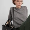 Bolso mediano de cuero con hebilla Prada y doble cinturón Bolso mediano de cuero con hebilla Prada y doble cinturón
