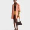 Bolso mediano de piel Prada Passage con solapa de Re-Nylon Bolso mediano de piel Prada Passage con solapa de Re-Nylon