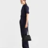 Bolso mediano de piel Prada Passage con solapa de Re-Nylon Bolso mediano de piel Prada Passage con solapa de Re-Nylon