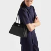 Bolso mediano de piel Prada Passage con solapa de Re-Nylon Bolso mediano de piel Prada Passage con solapa de Re-Nylon