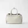 Bolso pequeño de cuero con hebilla y doble correa de Prada Bolso pequeño de cuero con hebilla y doble correa de Prada