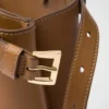Bolso pequeño de cuero con hebilla y doble correa de Prada Bolso pequeño de cuero con hebilla y doble correa de Prada