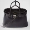 Bolso pequeño de piel con hebilla y correa de Prada Bolso pequeño de piel con hebilla y correa de Prada