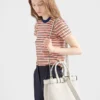 Bolso pequeño de piel con hebilla y correa de Prada Bolso pequeño de piel con hebilla y correa de Prada