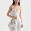 Bolso pequeño Prada Bonnie de lino estampado y cuero Bolso pequeño Prada Bonnie de lino estampado y cuero