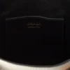 Bolso tipo cubo de cuero con hebilla Prada y cinturón con tachuelas