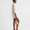 Bolso tipo cubo mini de ganchillo y cuero Bolso tipo cubo mini de ganchillo y cuero