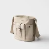 Bolso tipo cubo Prada Route Mini de lona y cuero Bolso tipo cubo Prada Route Mini de lona y cuero