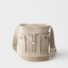 Bolso tipo cubo Prada Route Mini de lona y cuero Bolso tipo cubo Prada Route Mini de lona y cuero