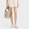 Bolso tipo cubo Prada Route Mini de lona y cuero Bolso tipo cubo Prada Route Mini de lona y cuero