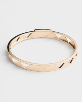 Brazalete rígido con aberturas Eternal Gold en oro amarillo