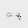 Broche de metal y perlas Broche de metal y perlas