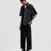 Camisa de denim con patchwork Camisa de denim con patchwork