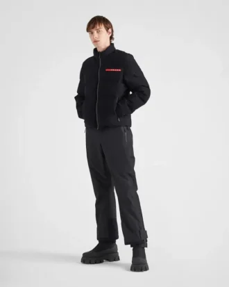 Chaqueta acolchada corta de punto técnico