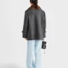 Chaqueta de doble botonadura con diseño en forma de V