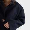 Chaqueta de lana de Shetland con botones de joyería Chaqueta de lana de Shetland con botones de joyería