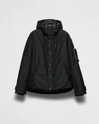 Chaqueta de plumón con capucha de tejido técnico