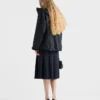 Falda midi de tejido técnico y hopsack Falda midi de tejido técnico y hopsack