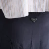 Falda midi plisada de seda