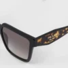 Gafas de sol con el logotipo de Prada