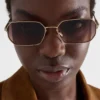 Gafas de sol con el logotipo triangular de Prada Gafas de sol con el logotipo triangular de Prada