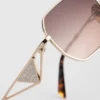 Gafas de sol con el logotipo triangular de Prada Gafas de sol con el logotipo triangular de Prada