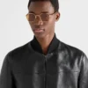 Gafas de sol con la icónica placa metálica Gafas de sol con la icónica placa metálica