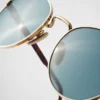 Gafas de sol con la icónica placa metálica Gafas de sol con la icónica placa metálica