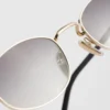 Gafas de sol con la icónica placa metálica Gafas de sol con la icónica placa metálica