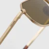 Gafas de sol con placa metálica icónica
