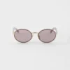 Gafas de sol Prada con la icónica placa metálica Gafas de sol Prada con la icónica placa metálica