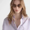 Gafas de sol Prada con la icónica placa metálica Gafas de sol Prada con la icónica placa metálica