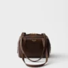 Mini bolso Prada Carry de piel envejecida con asa superior Mini bolso Prada Carry de piel envejecida con asa superior