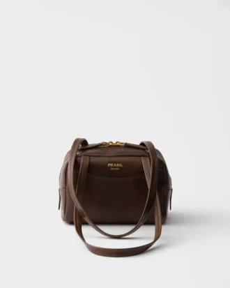 Mini bolso Prada Carry de piel envejecida con asa superior