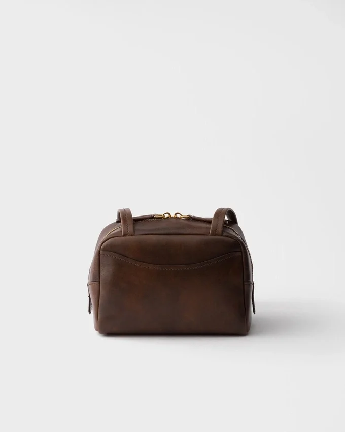 Mini bolso Prada Carry de piel envejecida con asa superior Mini bolso Prada Carry de piel envejecida con asa superior