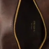 Mini bolso Prada Carry de piel envejecida con asa superior Mini bolso Prada Carry de piel envejecida con asa superior
