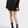 Minifalda de lana plisada con costura rush Minifalda de lana plisada con costura rush