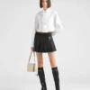 Minifalda plisada de Re-Nylon