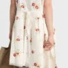 Minivestido de lino bordado con motivo floral Minivestido de lino bordado con motivo floral