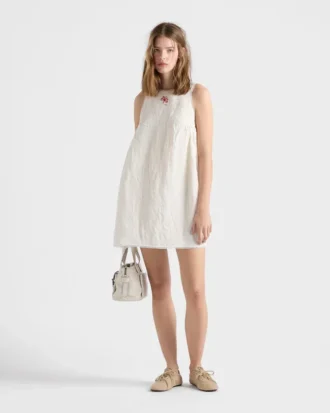 Minivestido de lona con hilos irregulares bordado